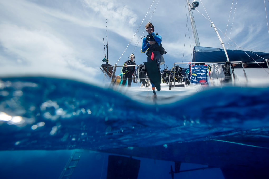 Scuba Diver about to jump off boat